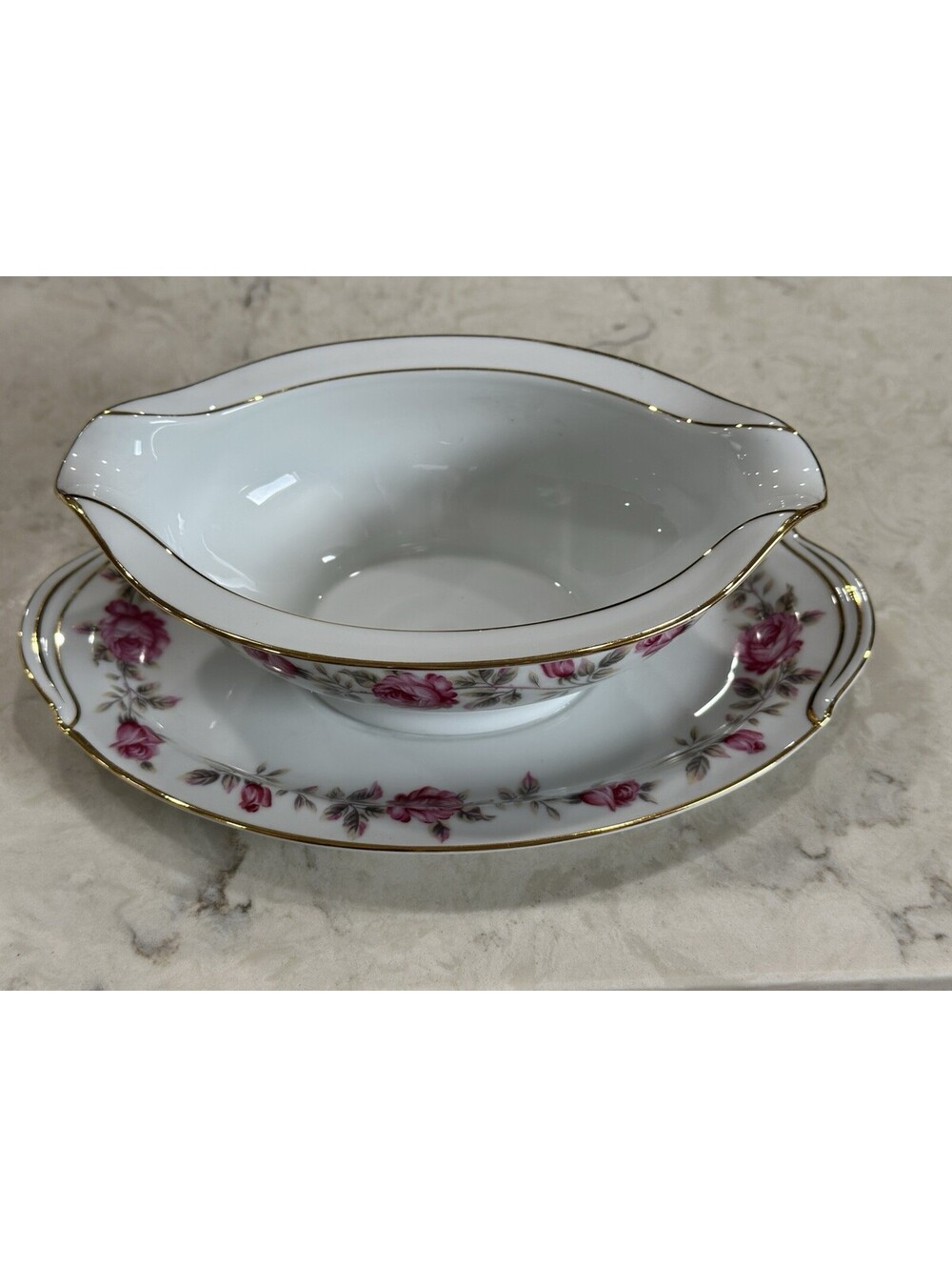 Nippon Toki Kaisha (Noritake) gravy boat with an attached underplate